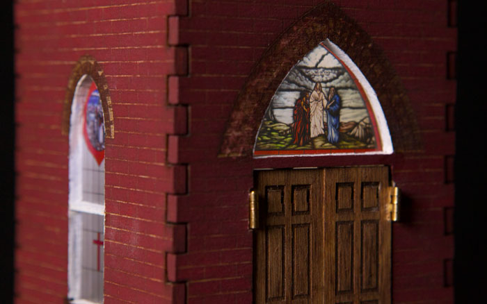 Closeup of stained glass windows in steeple replica